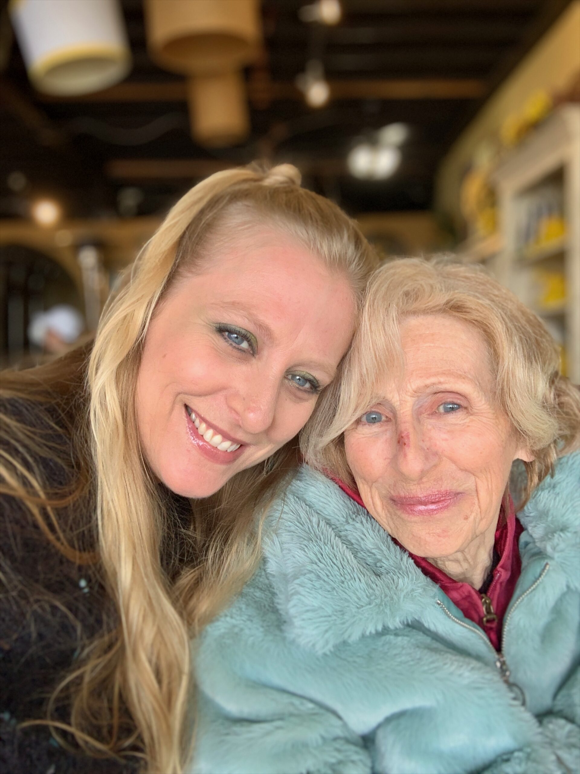 Julianne, a compassionate Medicare Insurance Advocate in San Luis Obispo County, shares a warm moment with her mother — reflecting her family values and heartfelt dedication to helping seniors with their Medicare needs.